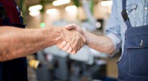 two gentlemen shaking hands